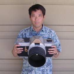 Gray with scale model pinhole camera