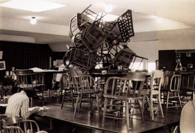Chairs stacked into a "fort"