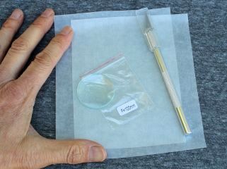 Lens, hobby knife, and paper vellum kit